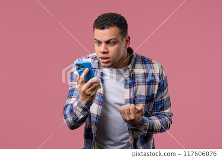 Angry Handsome Man Quarreling, Screaming Talking On Mobile Phone. Guy In Stress 117606076