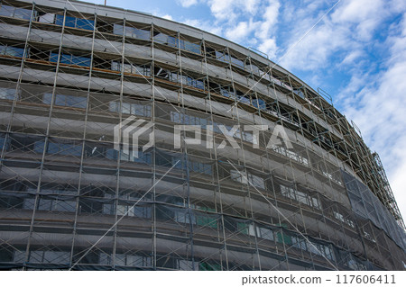 Scaffolding at a building construction site Scaffolding at a building construction site 117606411