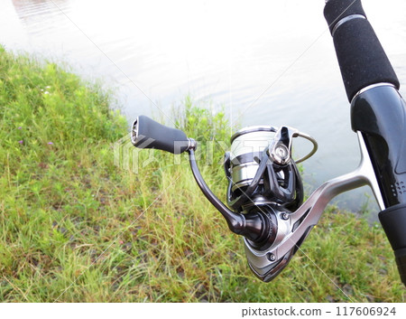 Enjoy fishing at the fishing spot using lure fishing rods and reels 117606924