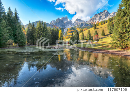 Amazing view of mountains and valleys with larch forest and lake are located in Filzmoos Amazing view of mountains and valleys with larch forest and lake are located in Filzmoos 117607106
