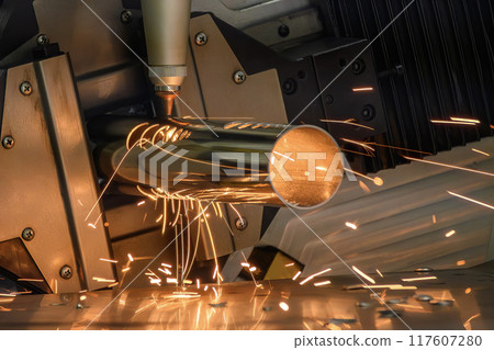 Close up scene the fiber laser cutting machine cut the stainless steel tube and sparkling light. Close up scene the fiber laser cutting machine cut the stainless steel tube and sparkling light. 117607280