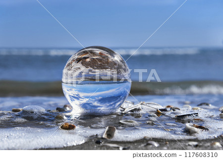 A beach landscape on a crystal ball 117608310