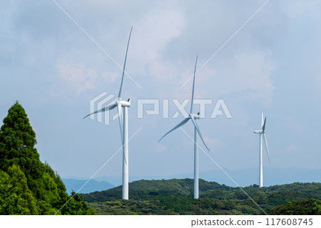 Wind turbines lined up on the mountain 117608745
