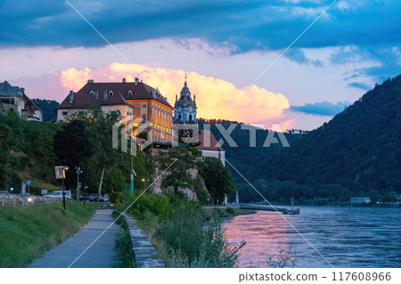 Durnstein town and Donau river in Wachau valley Austria on sunset. Traditional wine and tourism region, 117608966