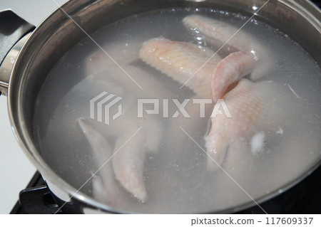 Boiling chicken wings Boiling chicken wings 117609337