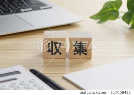 A block of building blocks with the word "collect" written on it A block of building blocks with the word "collect" written on it 117609481