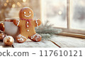 Gingerbread Man Cookie with Hot Chocolate in a Festive Setting 117610121
