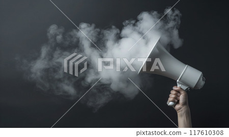 Hand holding megaphone with billowing smoke. Hand holding megaphone with billowing smoke. 117610308