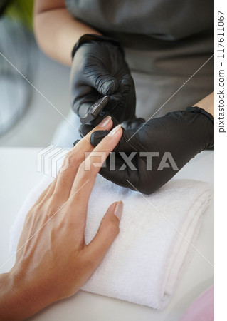 Trimming Nails with Professional Manicure Tools Trimming Nails with Professional Manicure Tools 117611067