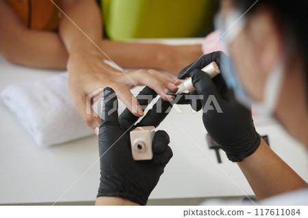 Professional Nail Technician Applying Nail Polish Professional Nail Technician Applying Nail Polish 117611084