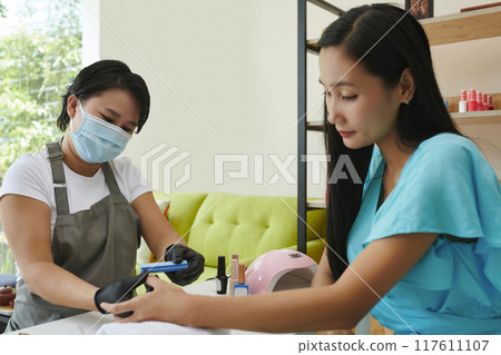 Providing Professional Manicure Services in Modern Salon 117611107