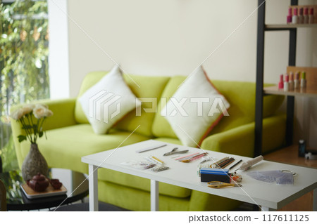 Relaxing Home Nail Salon Setup with Green Furniture 117611125