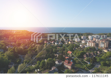 Baltic sea beach with Svetlogorsk town. Aerial view Baltic sea beach with Svetlogorsk town. Aerial view 117611145