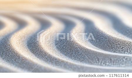 Rippling sand patterns created by gentle wind in a coastal area 117611314