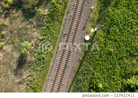 Railway through summer forest. Aerial view 117611411