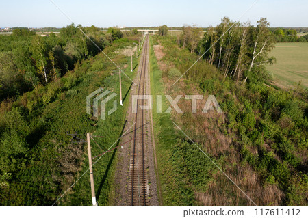 Railway through summer forest. Aerial view 117611412