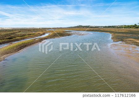 Landscape view of Parque Natural da Ria Formosa near Faro, Portugal Landscape view of Parque Natural da Ria Formosa near Faro, Portugal 117612166