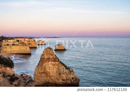Praia da Marinha Beach among rock islets and cliffs seen from Seven Hanging Valleys Trail, Algarve, Portugal Praia da Marinha Beach among rock islets and cliffs seen from Seven Hanging Valleys Trail, Algarve, Portugal 117612189