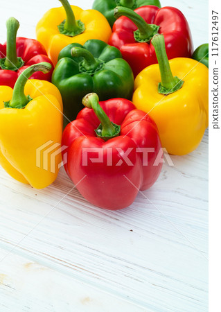 Fresh sweet bell pepper ( paprika ) photography red , green and yellow . Colorful vegetable . Top view 117612497
