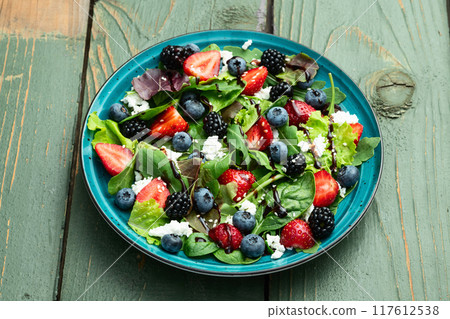 Berries salad (blueberry strawberry blackberry ) with cheese feta and balsamic sauce Berries salad (blueberry strawberry blackberry ) with cheese feta and balsamic sauce 117612538