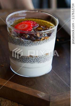 Nutritious Chia Seed Pudding with Granola and Strawberries is a healthy breakfast or dessert Nutritious Chia Seed Pudding with Granola and Strawberries is a healthy breakfast or dessert 117612734