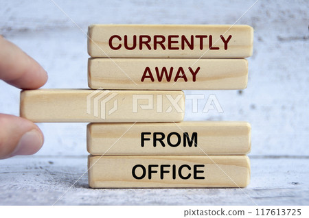 Currently away from office text on wooden blocks. Out of office concept 117613725