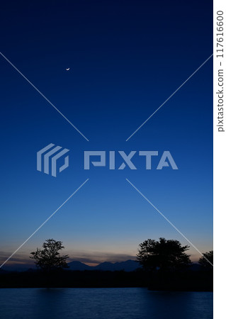 Crescent moon at dusk Crescent moon at dusk 117616600