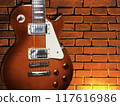 Red brick wall and Les Paul 117616986
