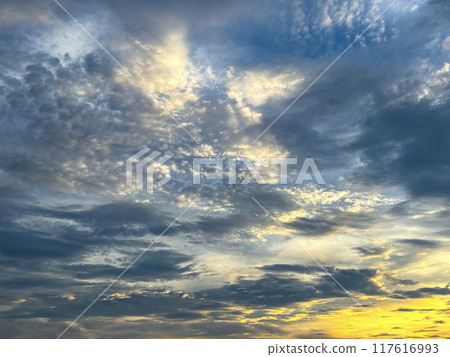 Sunset and thick clouds 117616993