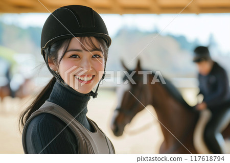 Women riding a horse 117618794