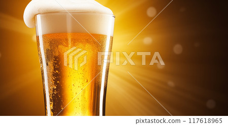 Glass of cold beer with foam, pint of original premium beer drink, alcohol flavour and holiday celebration idea 117618965