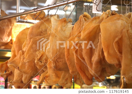 A fish bladder sold at a dried fish store in Des Voeux Road, Hong Kong. Very expensive and expensive Chinese food called "fish gall bladder" 117619145