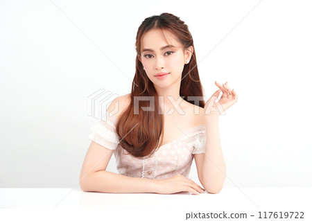 Beautiful young asian woman with clean fresh skin on white background, Face care, Facial treatment, Cosmetology, beauty and spa, Asian women portrait. Beautiful young asian woman with clean fresh skin on white background, Face care, Facial treatment, Cosmetology, beauty and spa, Asian women portrait. 117619722