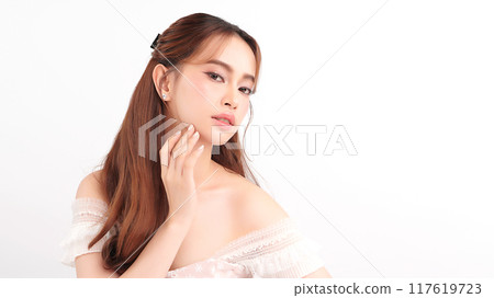 Beautiful young asian woman with clean fresh skin on white background, Face care, Facial treatment, Cosmetology, beauty and spa, Asian women portrait. Beautiful young asian woman with clean fresh skin on white background, Face care, Facial treatment, Cosmetology, beauty and spa, Asian women portrait. 117619723