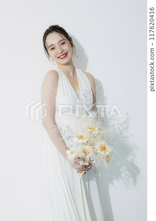 young woman in white dress young woman in white dress 117620416