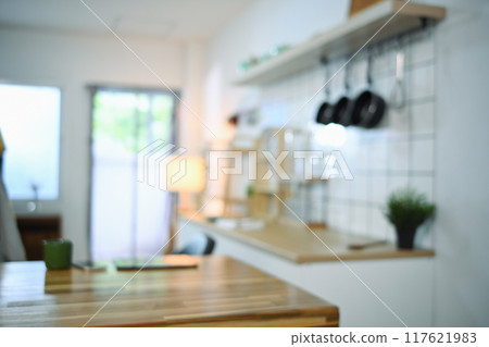 Blurred defocus minimal home kitchen with wooden counter 117621983