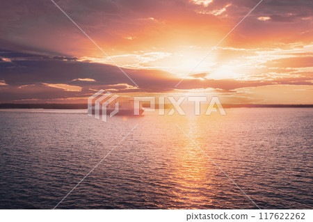 Stockholm, Sweden. Tourist Ship Or Ferry Boat Boat Liner Floating Near Islands In Summer Evening. Beautiful Seascape In Sunset Sunrise Time. Sun Sunshine Above Islands Archipelago 117622262