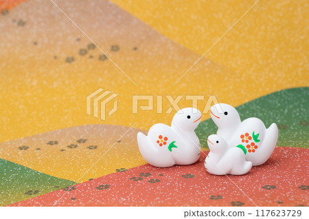 Year of the Snake New Year's material Red and white snake parent and child talking in the fields Year of the Snake New Year's material Red and white snake parent and child talking in the fields 117623729