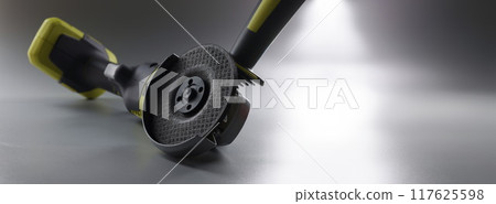 Cordless new hand sander on a gray background Cordless new hand sander on a gray background 117625598