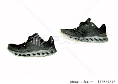 Sport shoes isolated on white background. Black sneakers running shoes 117625837