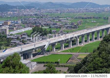 Hokuriku Shinkansen as seen from Mt. Iwanai (north direction, Sabae City) Echizen City, Fukui Prefecture 117626005