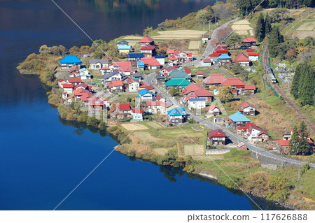 Scenery of the Tadami Line: Taishi village quietly standing on the banks of the Tadami River. Japan's Switzerland. Scenery of the Tadami Line: Taishi village quietly standing on the banks of the Tadami River. Japan's Switzerland. 117626888