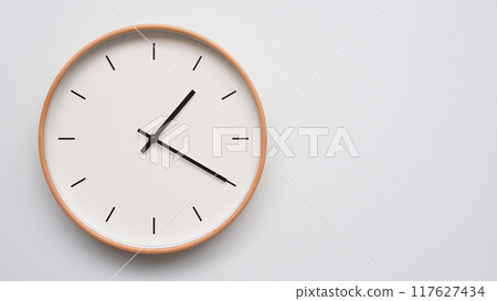 Minimalist wooden Wall Clock on White Wooden Surface with Space for Text. Time Set at 13.20/01.20 Minimalist wooden Wall Clock on White Wooden Surface with Space for Text. Time Set at 13.20/01.20 117627434