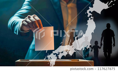 Voting scene with focus on hand holding ballot 117627875