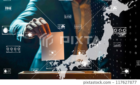 Voting scene with focus on hand holding ballot 117627877
