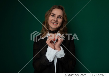 Woman Holding Heart Shaped Object 117627928