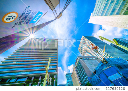 Tokyo cityscape in Japan - View of Kyobashi Station and office buildings in front of the Kyobashi intersection (redevelopment...) = August 11th 117630128