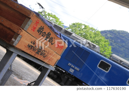 The Gunma Yokokawa train, pulled by the EF64-1001 locomotive, stops at Yokokawa Station with its famous ekiben (station bento) _ Photographed on August 17, 2024 117630190