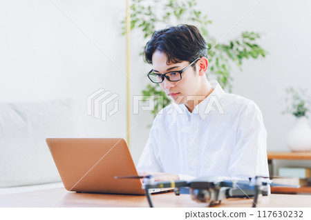 Home drone maintenance laptop 117630232