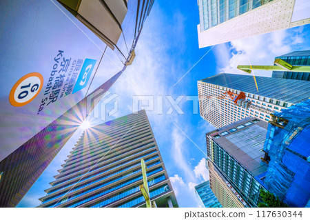 Tokyo cityscape in Japan - View of Kyobashi Station and office buildings in front of the Kyobashi intersection (redevelopment...) = August 11th 117630344